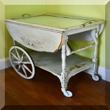 F43. Painted rolling tea cart. 27”h x 28”w x 18”d - $85 